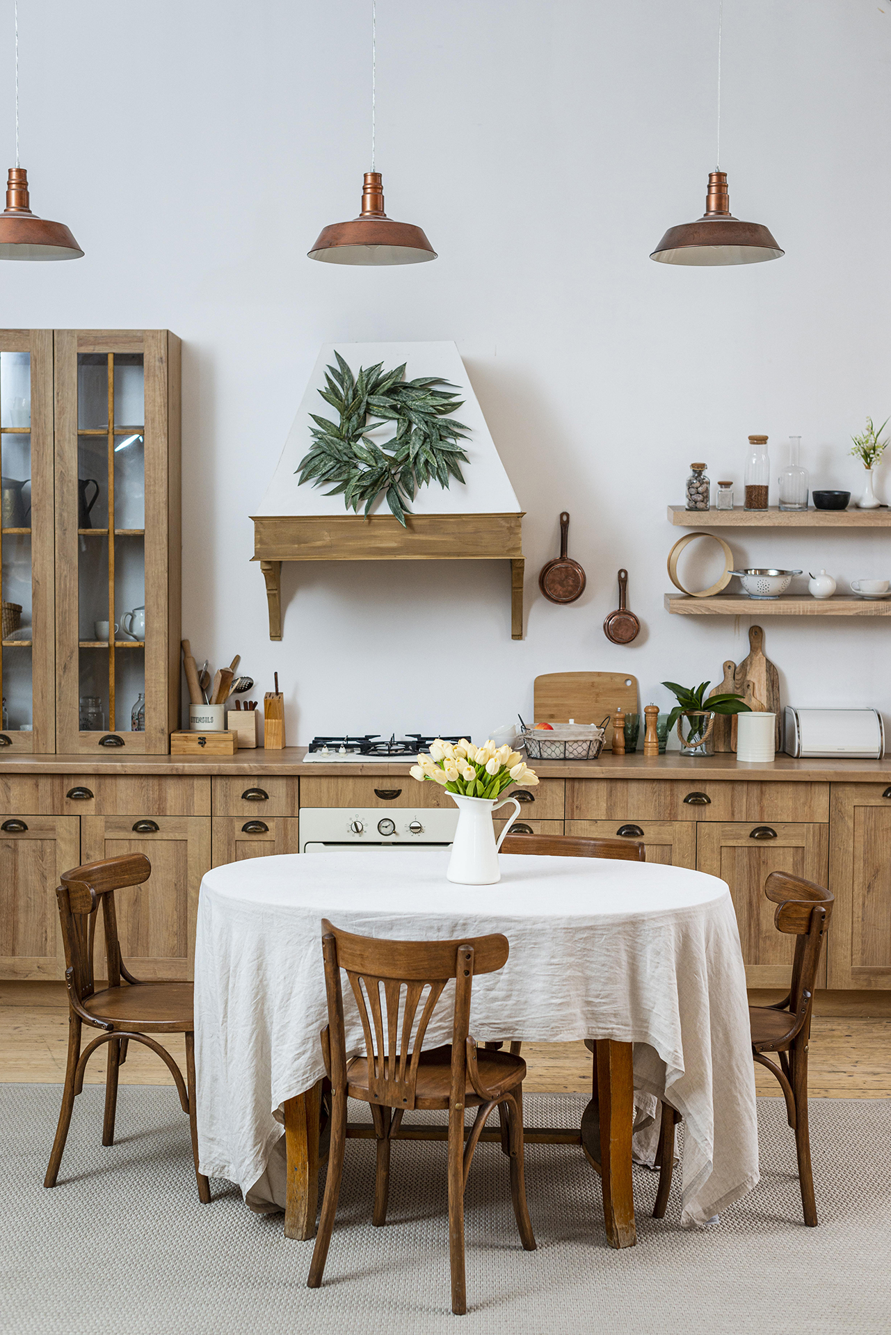 Farmhouse exterior renovation by DHHS Team showcasing rustic charm and natural beauty
